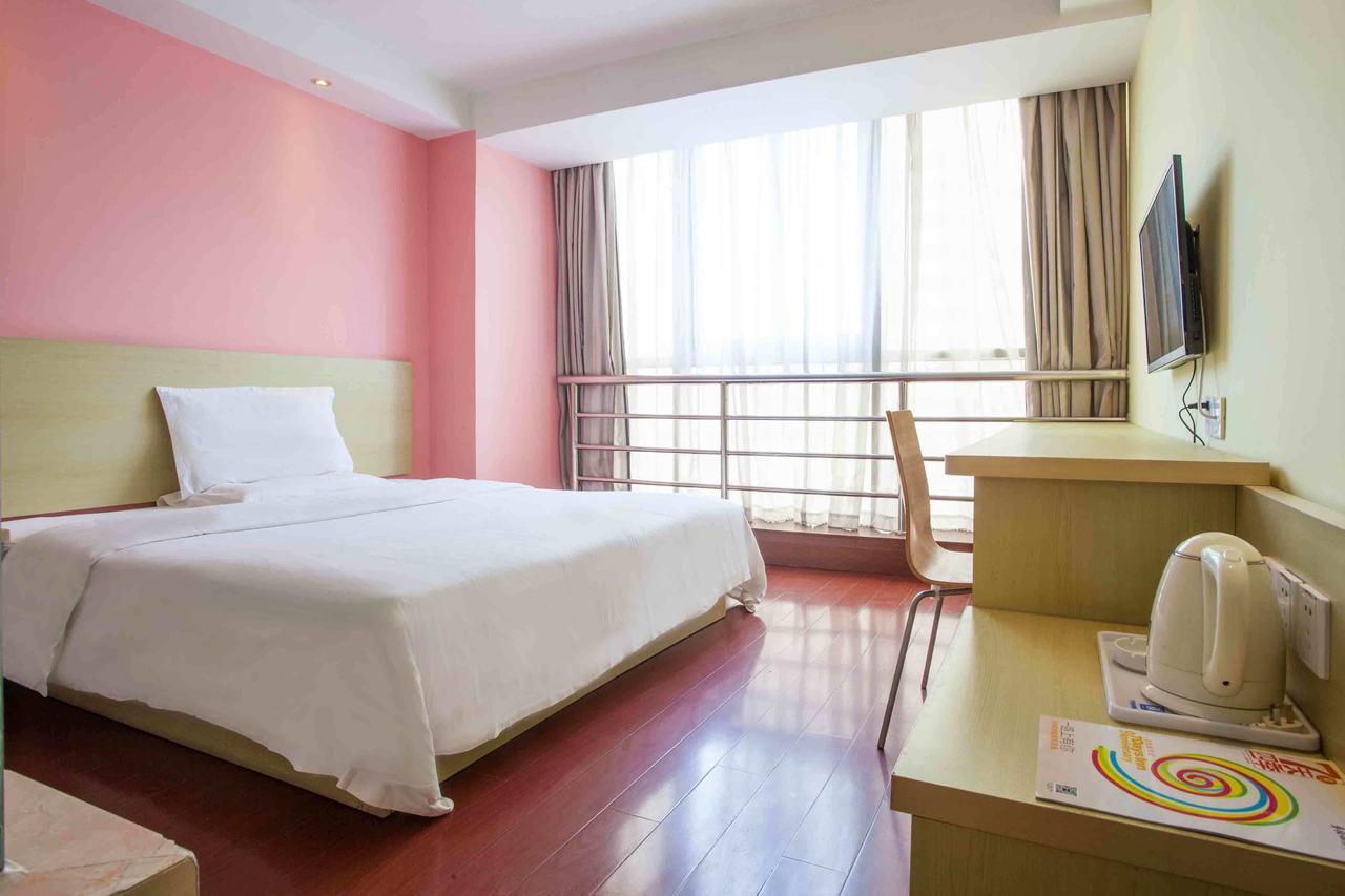 7Days Inn Xingyi Pingdong Avenue Экстерьер фото